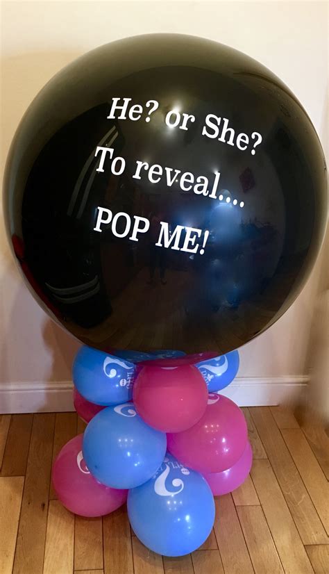 Gender Reveal Balloon Pop And An Explosion Of Blue Or Pink Confetti