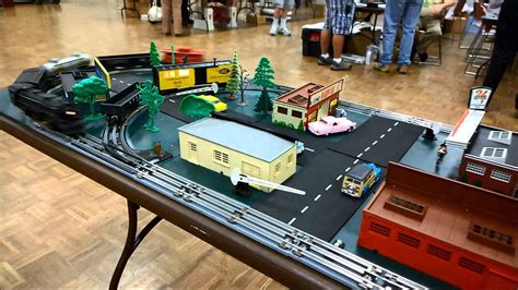 Lionel And Mth Trains Running On 14 Squares That Are Put Together To