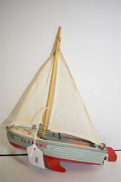 Haji Made In Japan Seahawk Wind Up Pressed Tin Sail Boat With Cotton