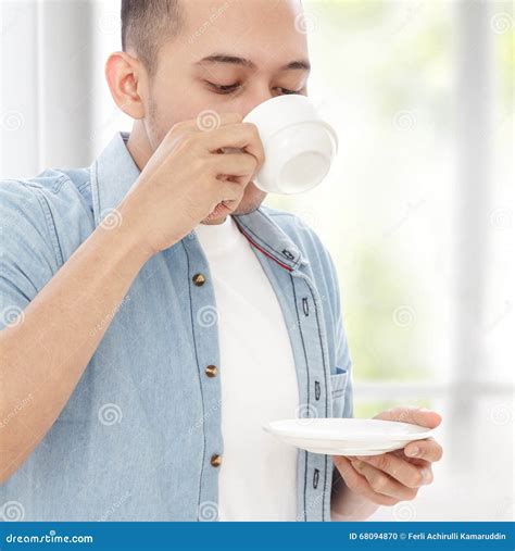 Young Casual Man Drinking A Cup Of Tea Stock Photo Image Of People