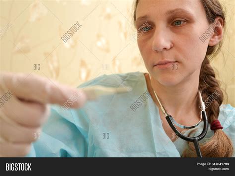 female doctor looks image and photo free trial bigstock
