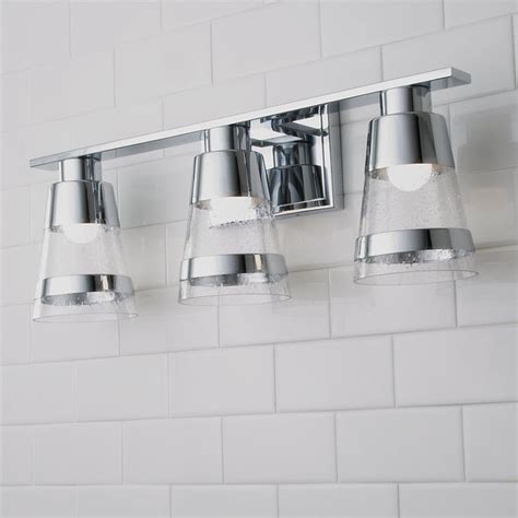 Furnishings, like a vanity, pedestal sink and bathroom mirror, will determine the type and placement. Seeded Band Vanity Light - 3 Light | Vanity lighting ...