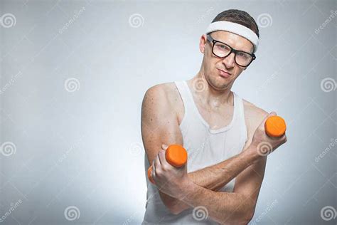 Funny Weak Man Lifting Biceps Stock Photo Image Of Lifting Lift