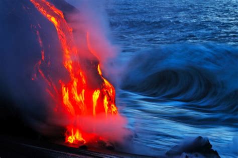 Nature Collides As Hot Lava Flows Into The Cool Ocean