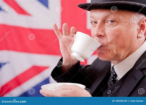 British Businessman City Worker With Bowler Hat Drinking Tea Stock