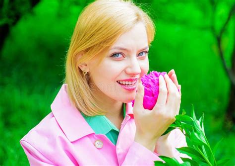 Cute Woman Smelling Peony Flower Beautiful Girl With Pink Flower Romantic Female In Spring