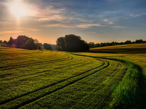 Fields and farms sunset landscape image - Free stock photo ...
