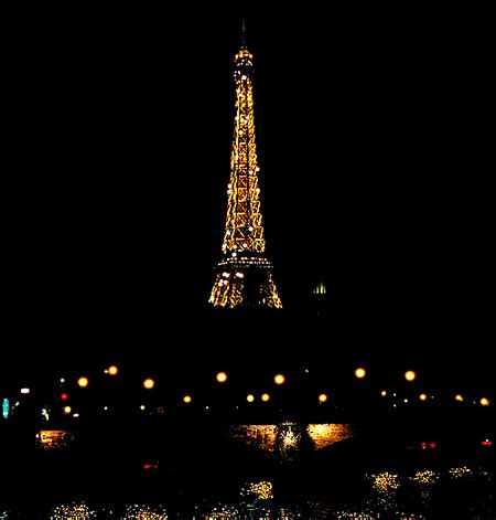 Eiffel tower with golden confetti isolated over black background and sign merry christmas paris eiffel tower france. eiffel tower on Tumblr