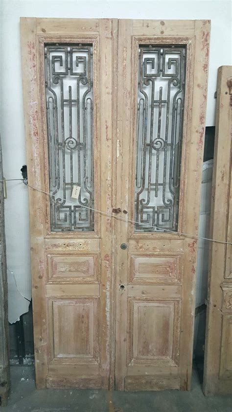 Pair Of Old Doors With Iron Inserts Antiquities Warehouse Wood