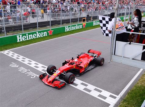 Ferrari Driver Sebastian Vettel 5 Of Germany Crosses The Finish Line
