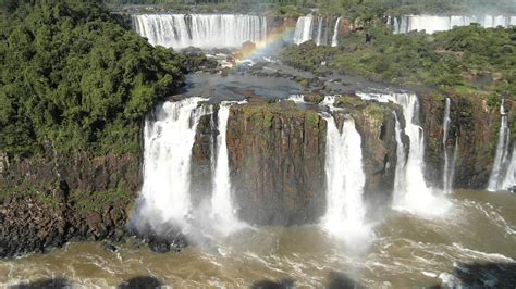 Free Images Waterfall Wild Spray Body Of Water Rainbow