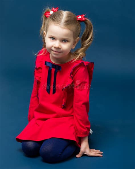 Charming Little Girl In Red Dress Sitting On Knees Stock Image Image