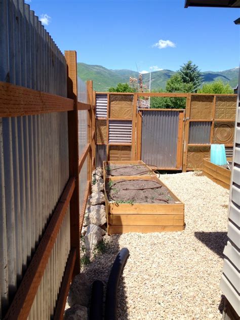Make the fence much stronger. corrugated metal fence diy