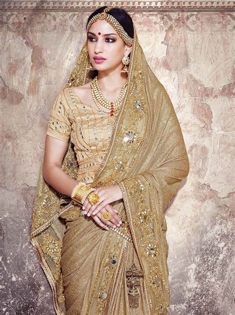 Golden Imported Fancy Fabric Saree With Mirror Work And Gota Blouse Golden Saree Blouse