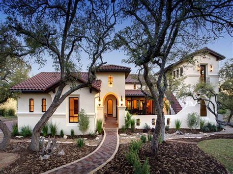 A unique and beautiful organizational piece that is sure to bring color and style to any space. Spanish Courtyard Mediterranean House Plans With Hacienda Homes Small Style in 2020 | Hacienda ...