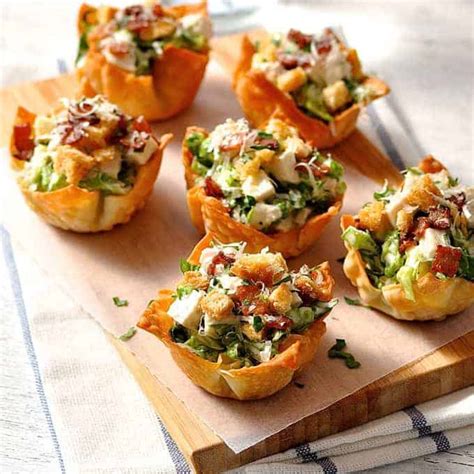 The edges should hang over. Caesar Salad Wonton Cups | RecipeTin Eats
