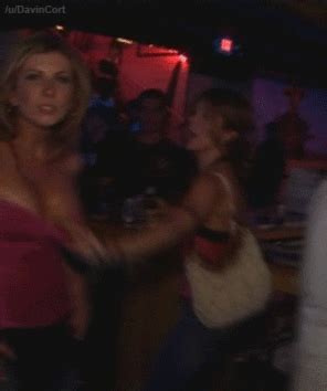 Her Friend Pulls Down Her Top In Public Porn Pic