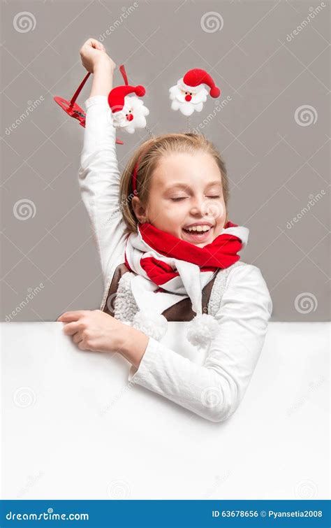 Happy Little Girl In The Christmas The Symbols On The Background Stock