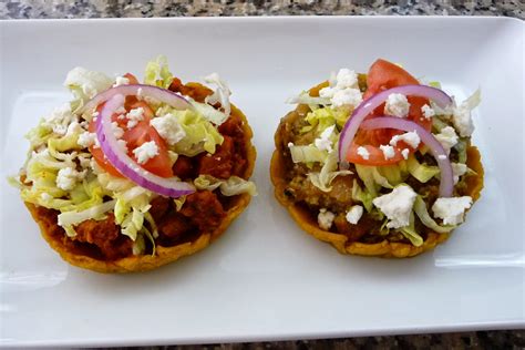 Mexican Sopes Filled With Pork Rinds In Green Sauce And Meat And Potato