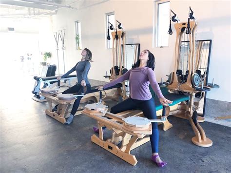 Arching On The Gyrotonic Pulley Tower In 2023 Studio Pilates Studio