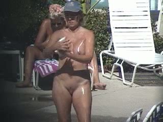 Ample Curly Mom Rubs Her Naked Body With Sunscreen By The Pool Mylust Com