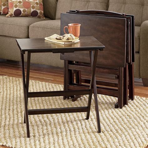 The finish is more of a paint, than a stain. 5-Piece TV Tray Table Set | Tv tray table, Tray table, Table