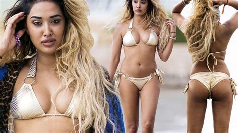 Downcast Zahida Allen Goes For Gold In Tiny Bikini After Epic Fight