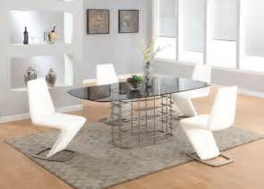 All our dining tables are available as sets with dining tables & chairs included in when choosing a glass topped dining table, something to consider is transparent glass or frosted glass. Abby Dining Table 5Pc Set Grey Glass Top by Chintaly