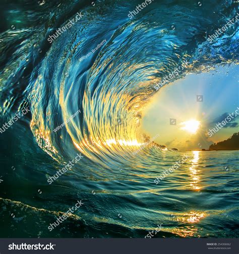 Breaking Ocean Wave Falling Down Sunset Stock Photo 65093608