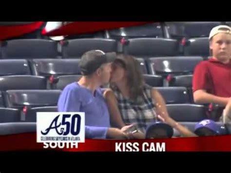 They are both shocked to see themselves on the big screen and have their first kiss together for everyone to see. Former President Jimmy Carter caught on kiss cam at ...