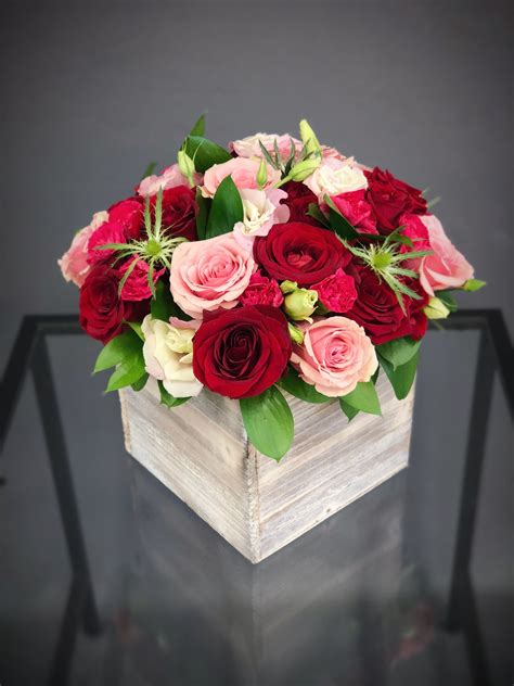 Large Wood Box Arrangement For A Table With Red And Soft Pink Roses And