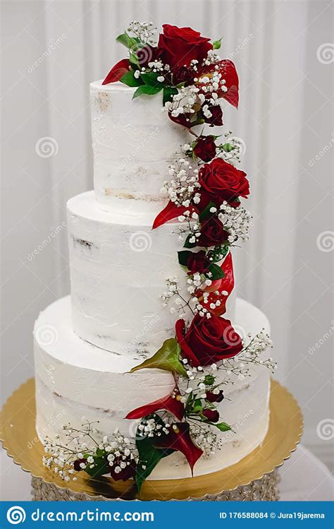 Close Up Of Beautiful Modern Three Tier Wedding Cake Decorated With