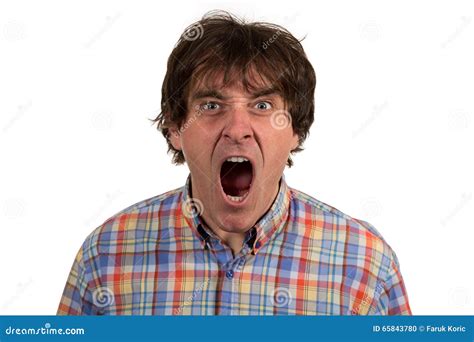 Close Up Portrait Of Young Man Yelling With Open Mouth Stock Photo