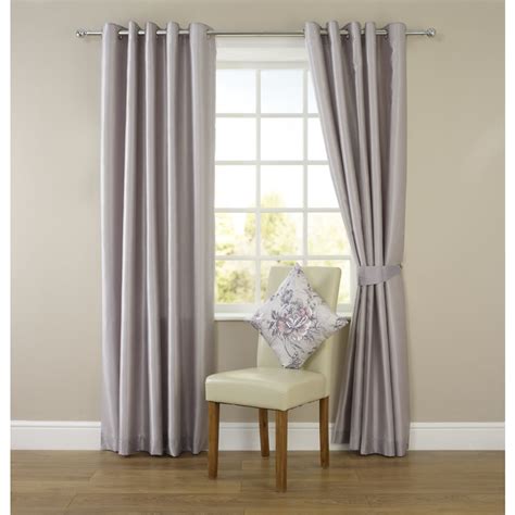 Hang them right above the window. Window Treatments for Wide Windows - HomesFeed