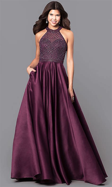 Silky satin fabrics are ideal for creating all kinds of stylish dress shapes, particularly stunning ball gown prom. Long Satin Illusion Prom dress with Pockets-PromGirl