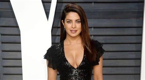 priyanka chopra wows all in this edgy black dress at las vegas cinemacon fashion news the