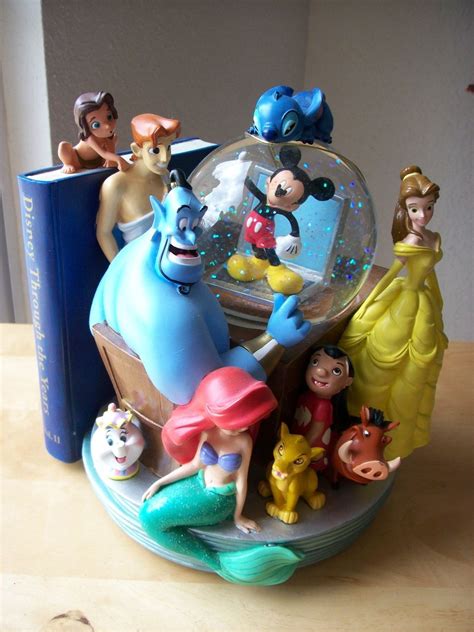 Disney Through The Years Vol Ii Musical And Animated Bookend Snowglobe