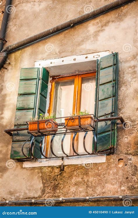 Buildings With Traditional Venetian Windows In Venice Italy Stock