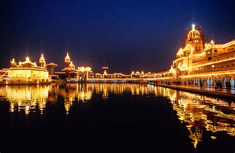 The Golden Temple Holiest Sikh Shrine Illuminated At Night Amritsar