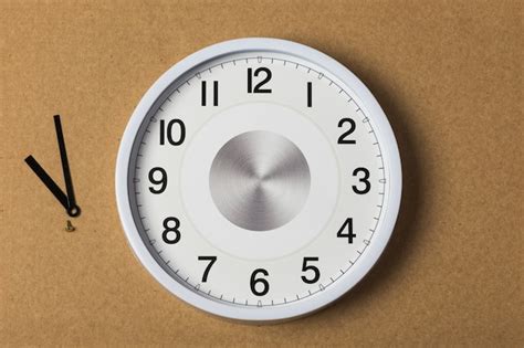 Premium Photo White Dial Of Wall Clock Without Hands With A Set Of Arrows