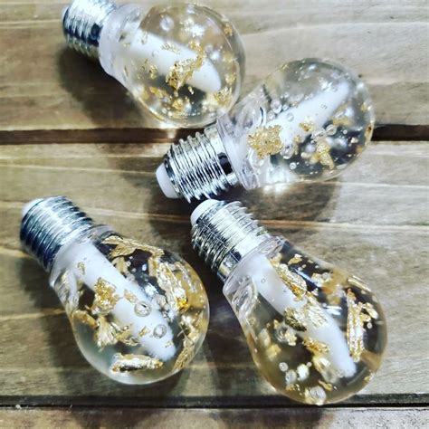 Browse and get inspired by our homeware & daily use catalog. Gold Bling Light Bulb Lip Gloss Metallic Golden Flakes | Etsy | Bling light, Lip gloss, Lip ...