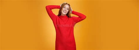 Romantic And Sensual Cute Ginger Girlfriend In Elegant Warm Red Winter Dress Holding Hands
