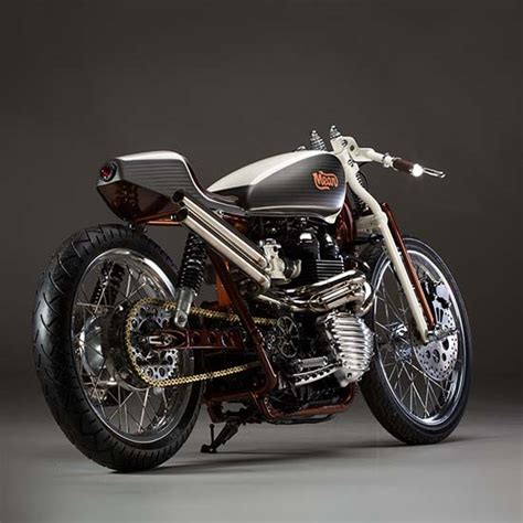 One of the things we consistently enjoy about good cafe racer design is clean, beautiful lines that tell us everything we want to hear about the simple beauty of speed. This Custom-Built Triumph Bonneville by Mean Machines Is A ...