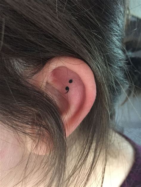 What does it mean to have a semicolon on your wrist? My new Semicolon tattoo on inner ear. Love it. Means so ...