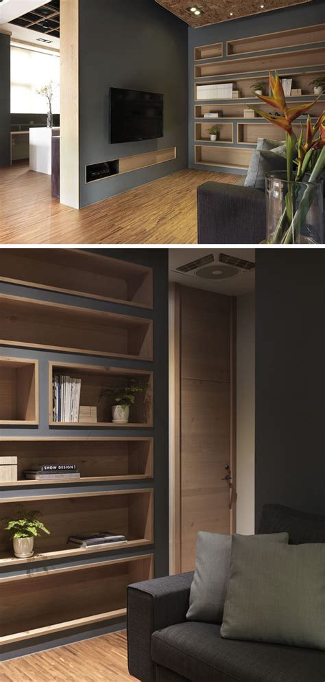 Amazing gallery of interior design and decorating ideas of built in bookshelf in living rooms, dens/libraries/offices, girl's rooms, nurseries, boy's rooms, entrances/foyers by elite interior designers. Built-In Bookshelves Lined With Wood Highlight The ...