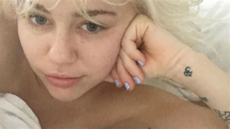 Miley Cyrus Gets Matching Wave Tattoo With Liam Hemsworths Sister In