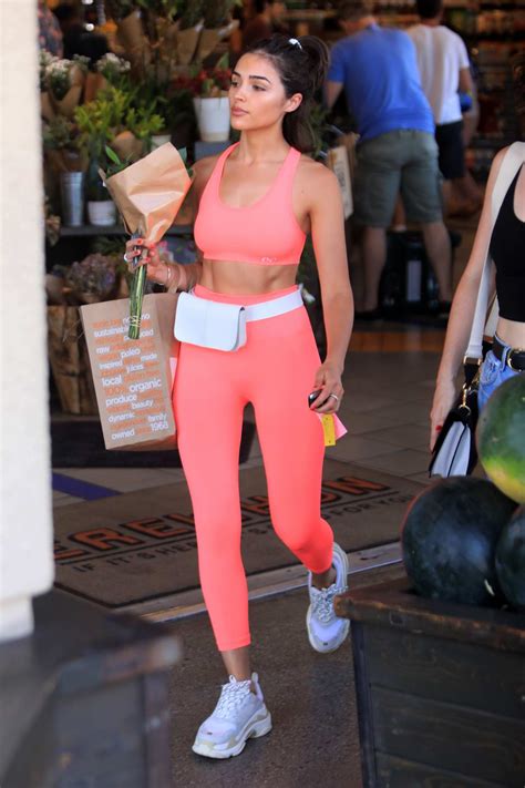 Olivia Culpo Shows Off Her Toned Abs In Her Pink Workout Gear While