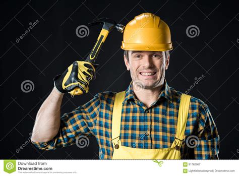 worker holding hammer stock image image of gesturing 91782967
