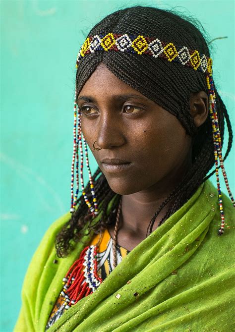 Portrait Of An Afar Tribe Girl With Braided Hair And Nose Ring Afar
