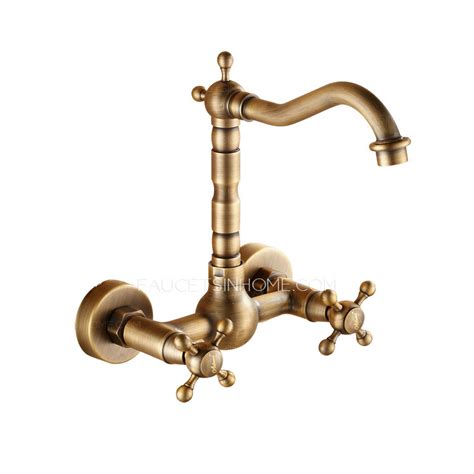 Save counter space with the traditional faucet that features a victorian spout complemented with elegant lever handles. Vintage Antique Brass Rotatable Wall Mount Bathroom Faucet